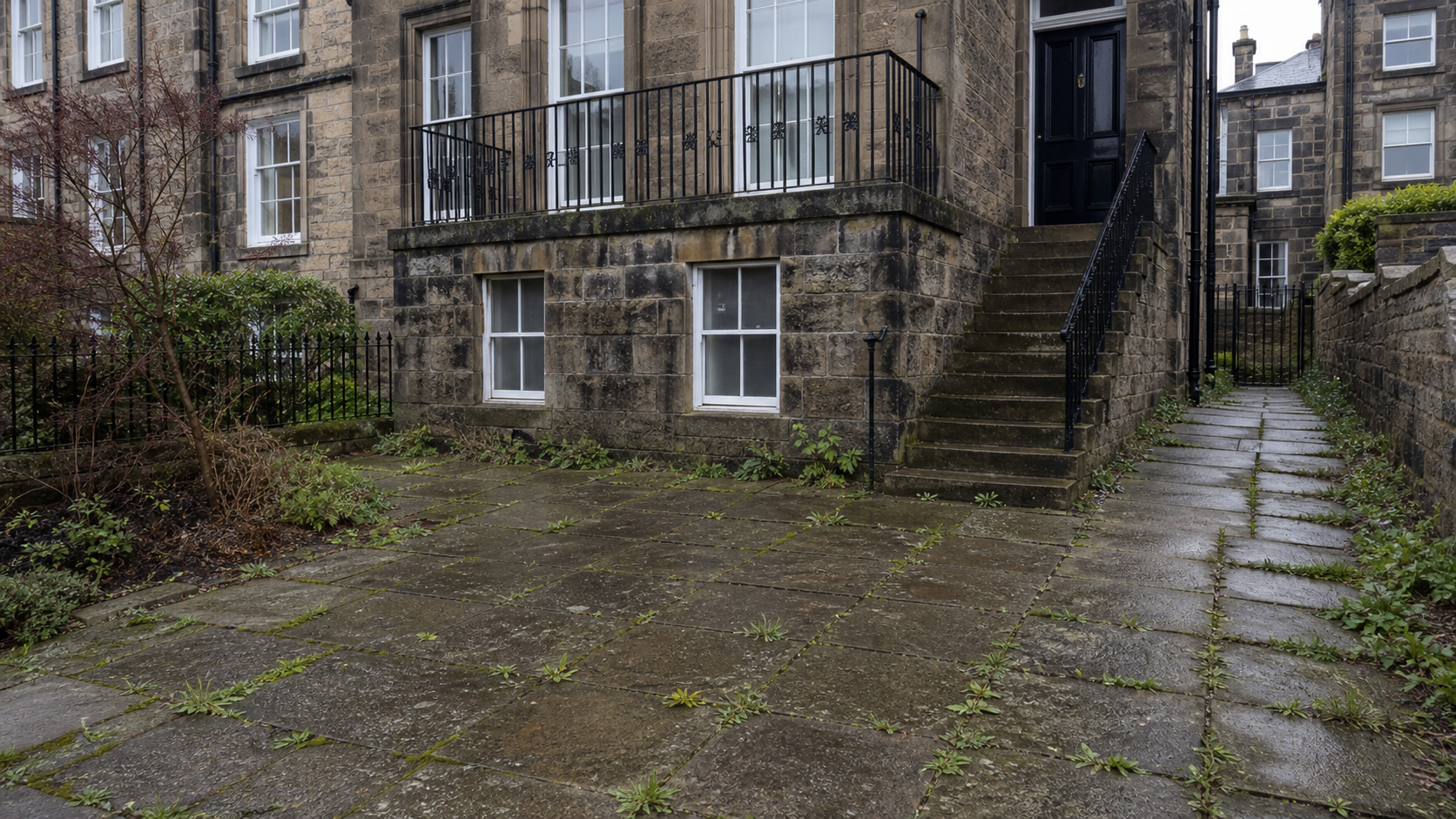 Stone courtyard before pressure washing